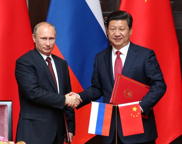 China, Russia pledge increased cooperation - ảnh 1